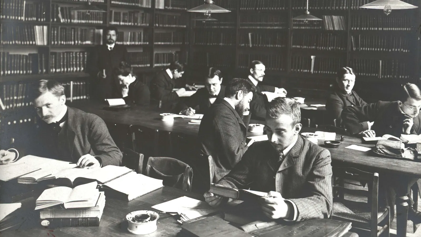 Scholars at work in a study room of the Sorbonne library at the turn of the twentieth century.