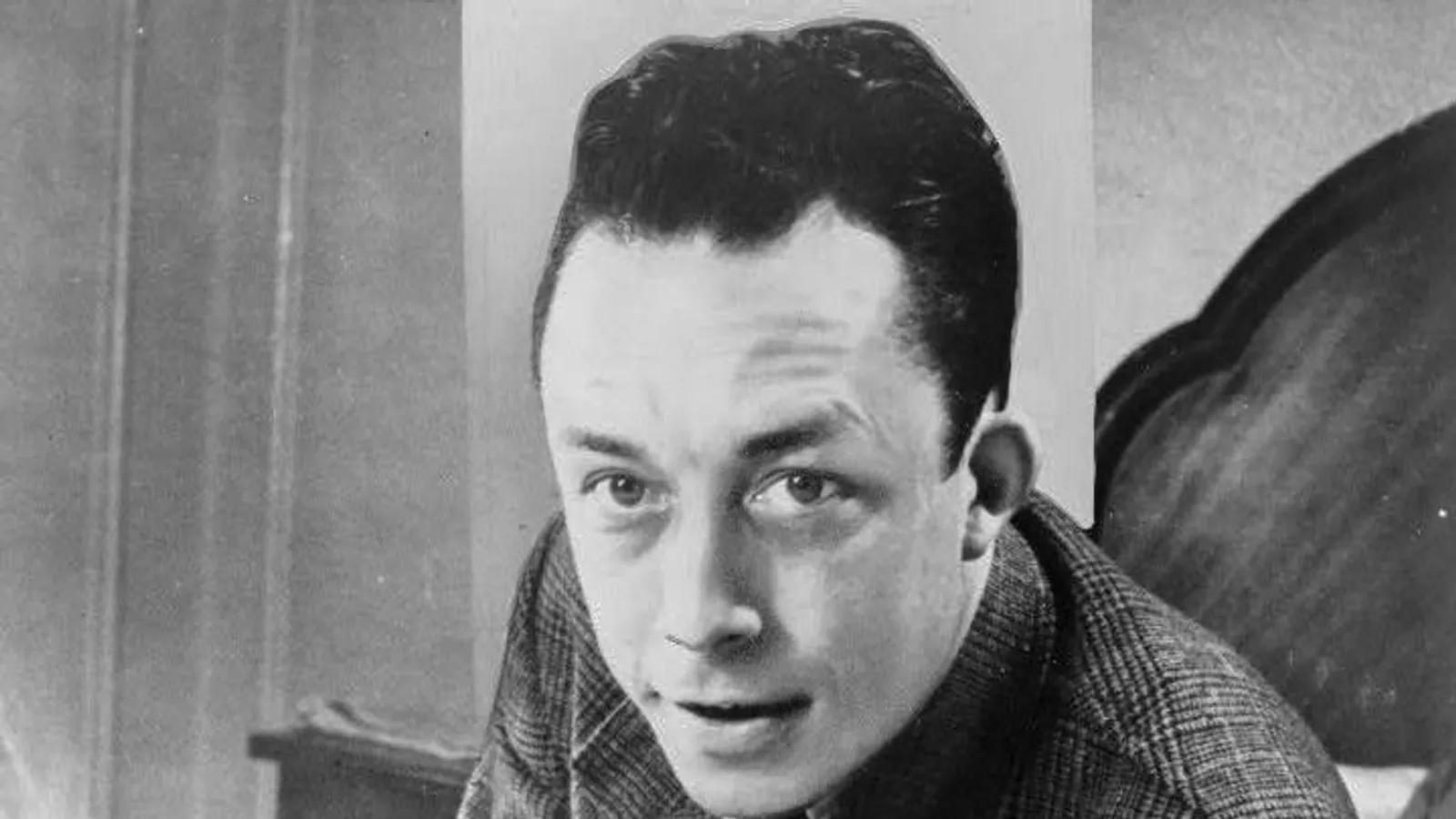 Portrait of Albert Camus at his desk in 1957, the year of the Nobel Prize.