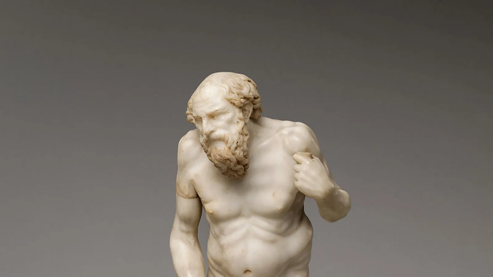 Roman marble statue of Diogenes of Sinope, bearded head and torso.