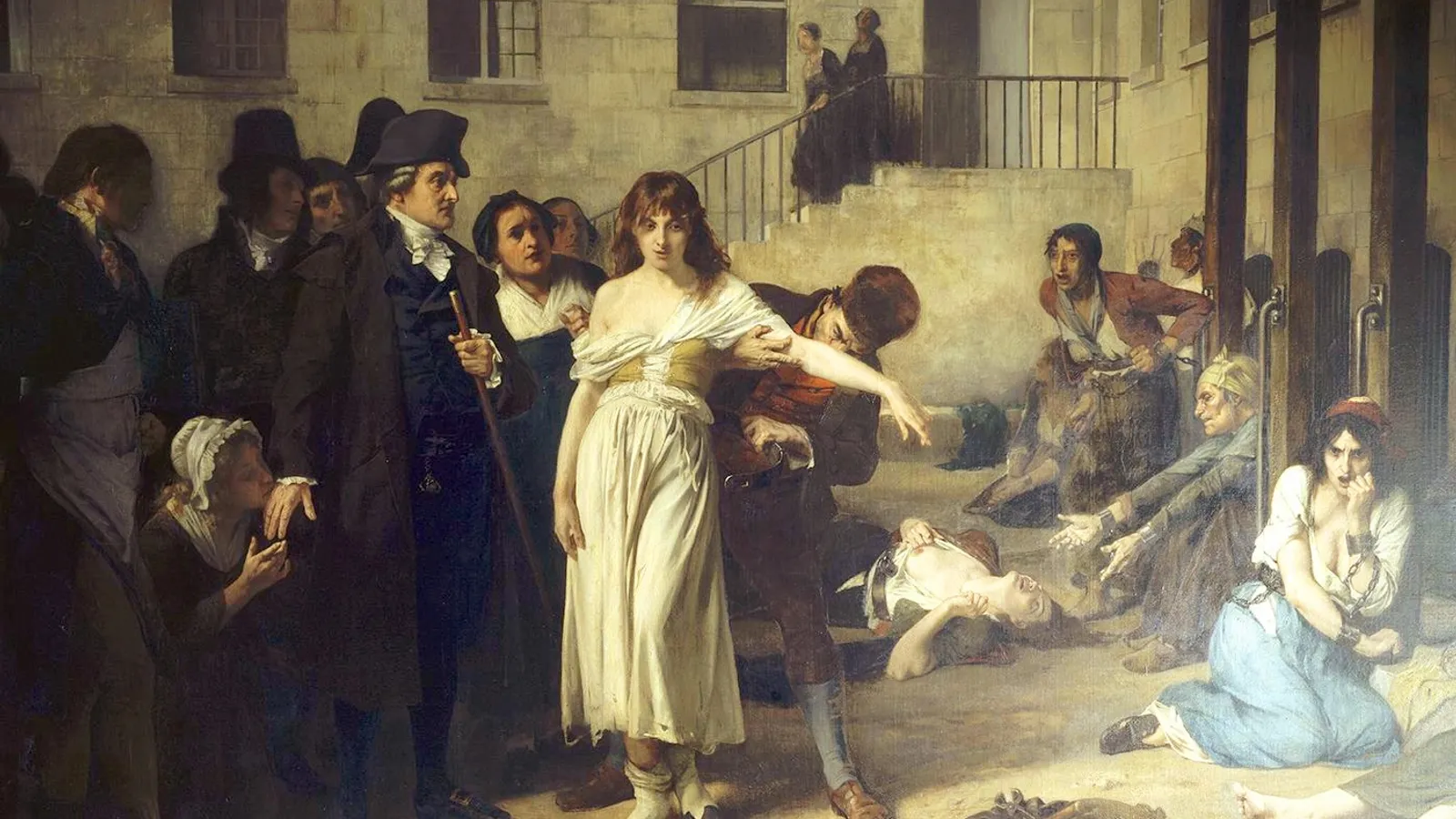 Nineteenth-century history painting of Philippe Pinel ordering the removal of chains from inmates at La Salpêtrière asylum in Paris.