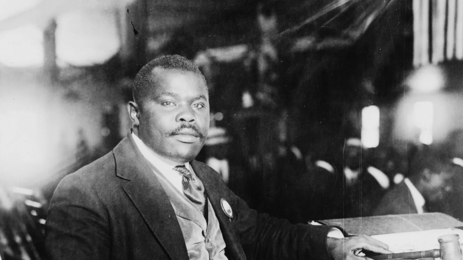 Marcus Garvey in academic regalia at a UNIA event in Harlem in the early 1920s.