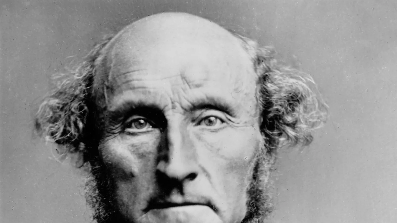 Photographic portrait of John Stuart Mill in middle age.