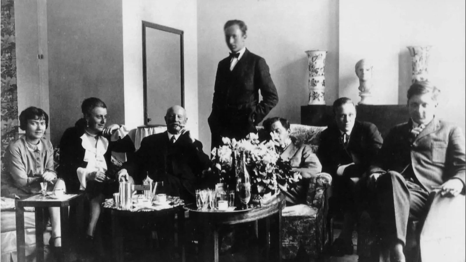 Wittgenstein at the center of a Viennese family parlor gathering in the 1920s.